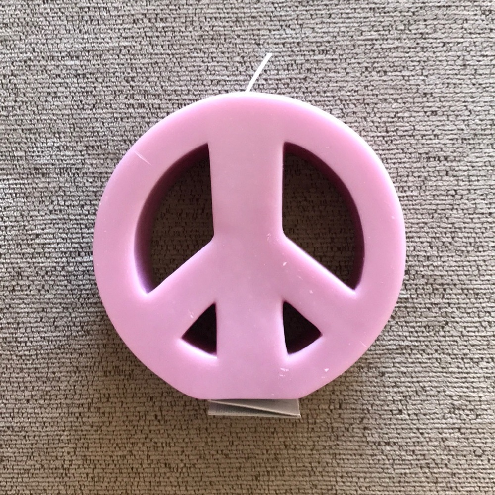 Urban Outfitters Peace sign candle